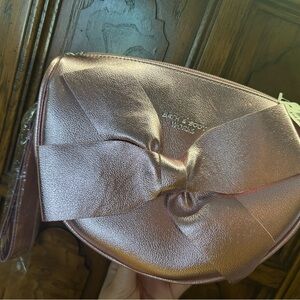 BATH AND BODY WORKS Bow-Accent Metallic Pink Clutch